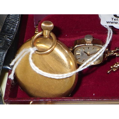 328 - A pocket watch, having a pin set movement in a yellow metal front and back case marked 18k, 38mm acr... 