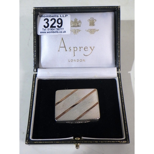 329 - A silver pill box, Asprey & Co Ltd, Birmingham 1991.  Base engraved with initials JJG. 44 x 32mm / 4... 