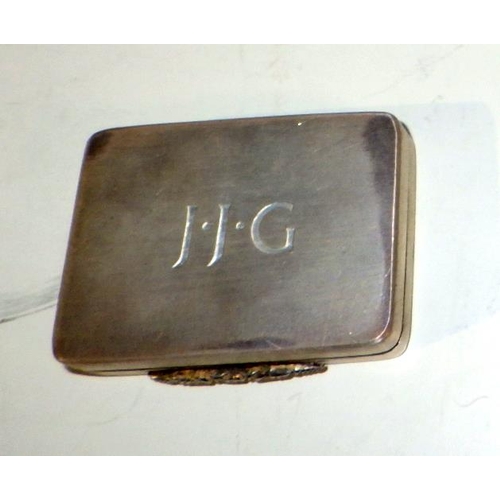 329 - A silver pill box, Asprey & Co Ltd, Birmingham 1991.  Base engraved with initials JJG. 44 x 32mm / 4... 