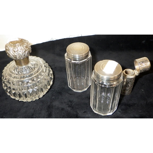 333 - A late Victorian scent bottle, cut glass with a screw-on silver lid, stopper lacking, 100mm tall; a ... 