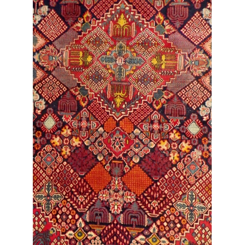 295 - A Red ground rug 130cm x 220cm