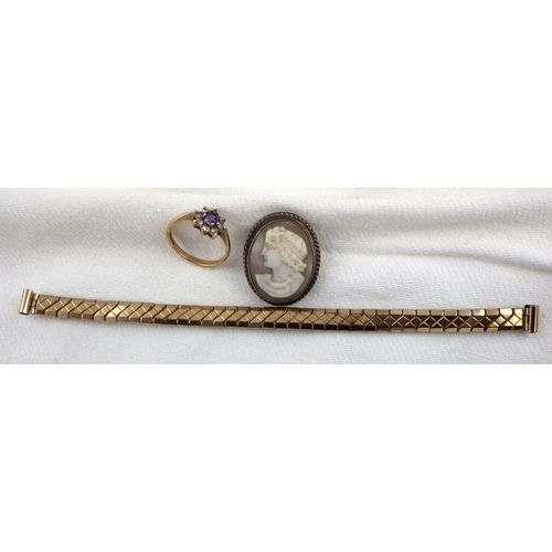 314 - A 9ct gold ring together with a cameo broach a rolled gold watch strap (3)