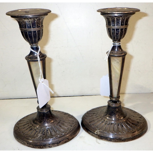 356 - A pair of silver candlesticks together with a silver ink well, cigarette box and a silver cup