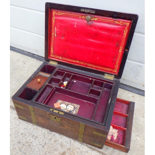 836 - A 19th cen rosewood and brass bound travelling box, 35cm wide, a/f