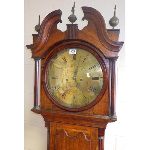 839 - An oak longcase clock with eight day movement and circular brass face, Sam Hill, Sheffield