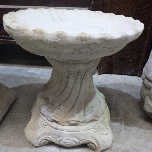 759 - A short concrete bird bath 36cm tall