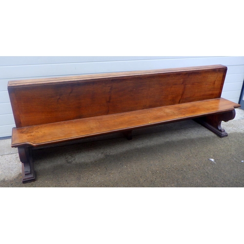 A 20th Century walnut pew, Ex. York Minster.  cm long
These pews were designed by Sir Walter Tapper (architect, Surveyor of the Fabric at Westminster Abbey and Consulting Architect at York Minster) and made by R Bridgeman & Sons, Lichfield