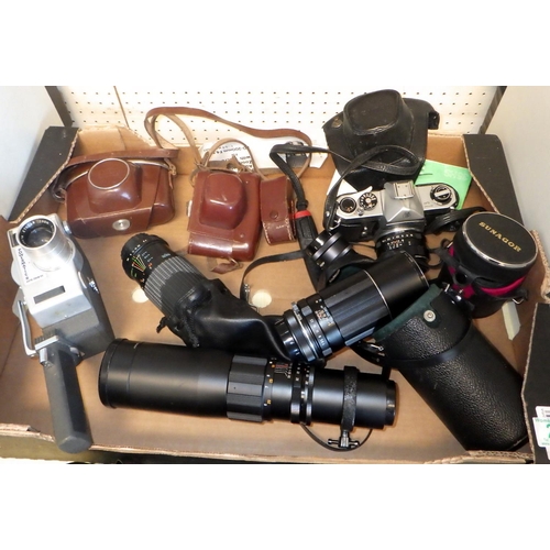 24 - A quantity of cameras and lenses including a Pentax Asahi Spotmatic