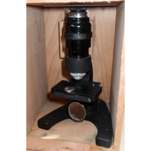 8 - A mahogany mantle clock together with a small cased microscope