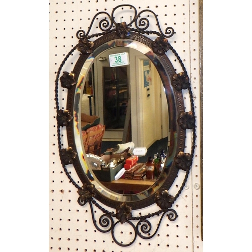 38 - A pair of small oval mirrors