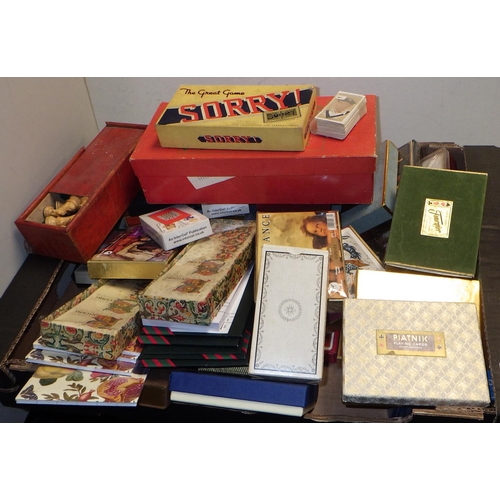 114 - A quantity of playing cards and bridge score cards together with a mah-jongg set and chess pieces
So... 