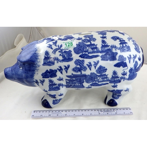 128 - A large oriental decorated blue and white piggy bank: 45cms snout to tail