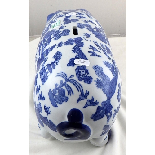 128 - A large oriental decorated blue and white piggy bank: 45cms snout to tail