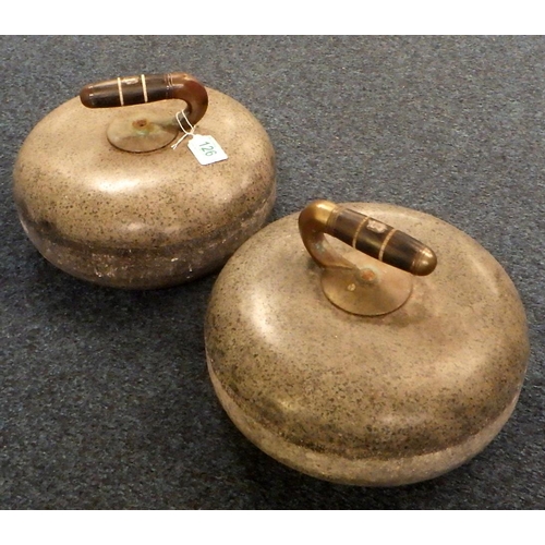 126 - A pair of curling stones of Ailsa Craig granite with ebonised handles each bearing a vacant escutche... 