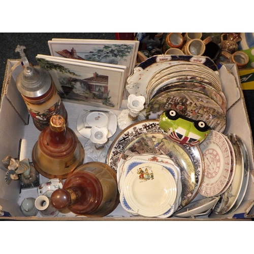 167 - A large qty of misc ceramics to include cabinet plates, Bells decanters, commemorative cups, a very ... 