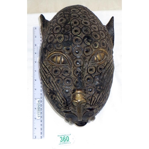 A bronze leopard head, cast in Benin / West African manner. 27cm long