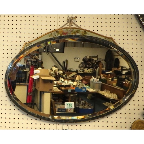 110 - A painted framed oval bevelled mirror 59 x 42cm