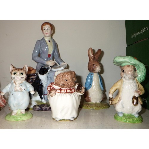 219 - A group of John Beswick Beatrix Potter figures together with a Rockingham Beatrix Potter figure