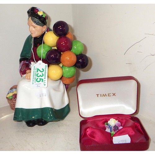 235 - A Royal Doulton Balloon seller HN 1315 together with a ceramic broach (2)