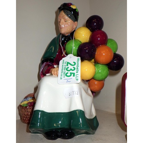 235 - A Royal Doulton Balloon seller HN 1315 together with a ceramic broach (2)