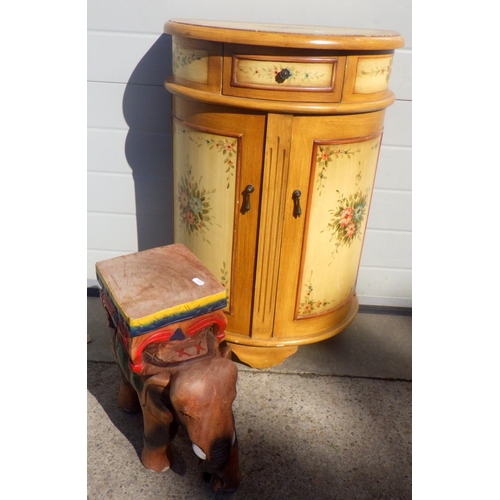 774 - A painted curved cupboard together with a hardwood elephant (2)