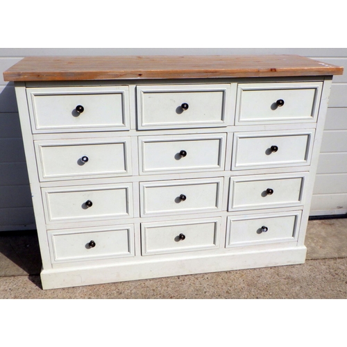 795 - A multi drawer chest of drawers