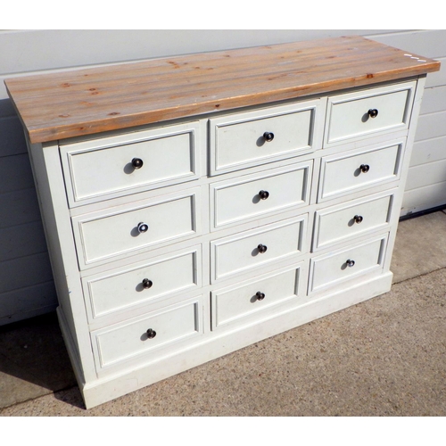 795 - A multi drawer chest of drawers