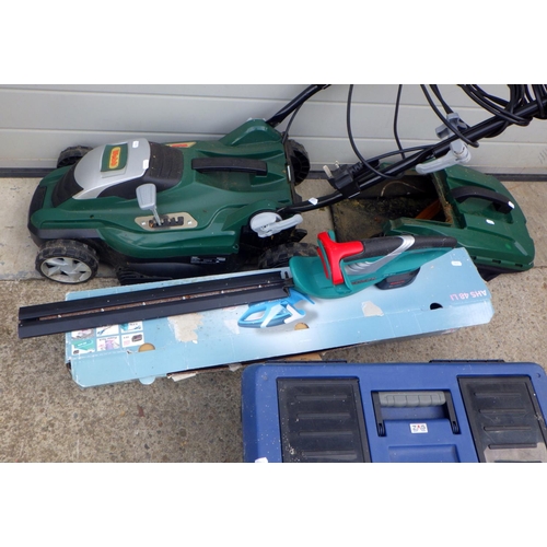 802 - A Webb lawn mower, Bosch trimmers etc