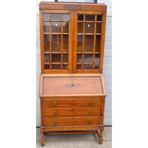 805 - A 1930s oak bureau bookcase