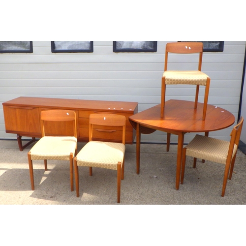 806 - A Beautility teak sideboard (middle drawer runners af) drop leaf table and four chairs (6)