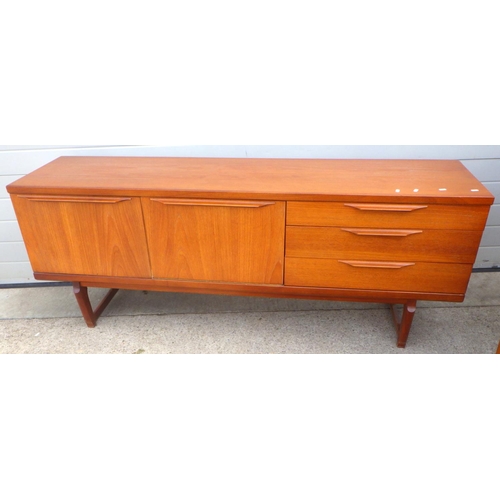 806 - A Beautility teak sideboard (middle drawer runners af) drop leaf table and four chairs (6)