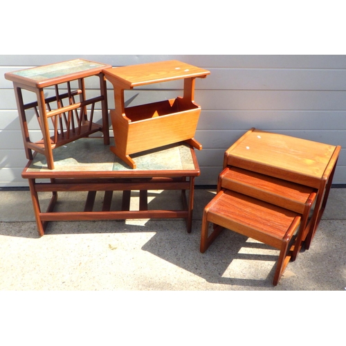 807 - A teak nest of three table together with a coffee table and two magazine racks (4)