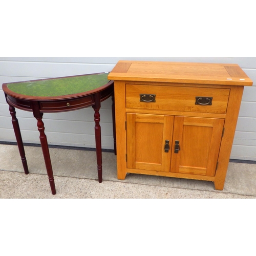 819 - A modern light oak low cupboard, 80cm wide together, with a demi-lune side table (2)