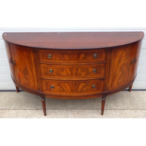 825 - A reproduction mahogany bowfronted sideboard, 168cm wide