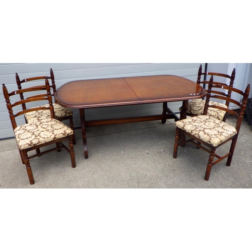 830 - An extending dining table with four ladderback chairs (5)