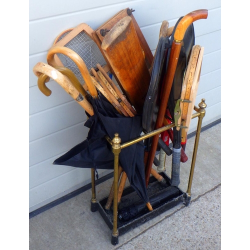 840 - A brass stick stand together with various raquets etc
Sold on behalf of the Terry family York (Terry... 