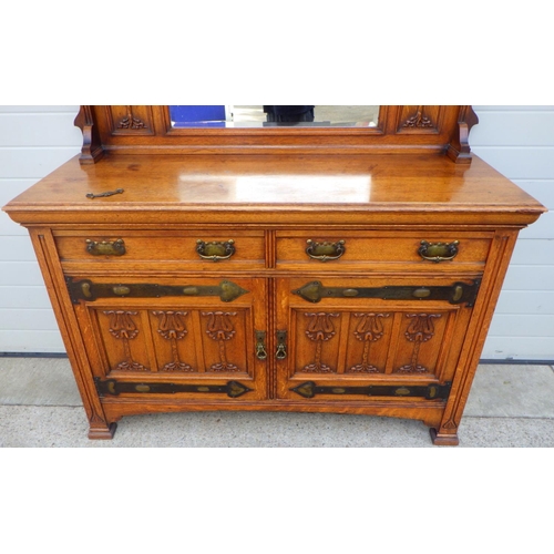 849 - An Arts & Crafts oak mirror back sideboard, 153cm wide,