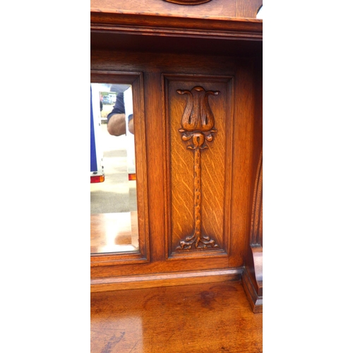 849 - An Arts & Crafts oak mirror back sideboard, 153cm wide,