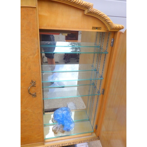 853 - A 1930's satin walnut arched hanging cabinet top with glass shelves, 97cm wide