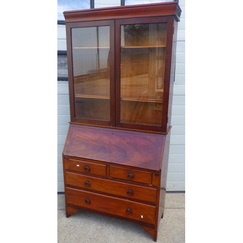 854 - A mahogany bureau bookcase, 100cm wide