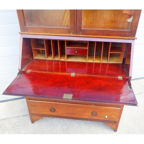 854 - A mahogany bureau bookcase, 100cm wide