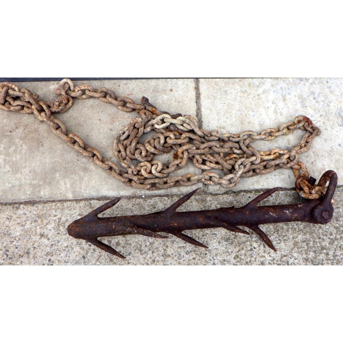 878 - A metal anchor ? & chain 62cm long