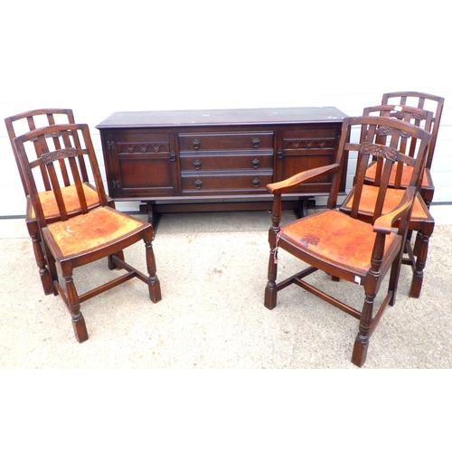 887 - An oak sideboard & five chairs