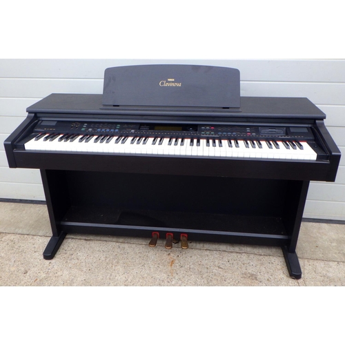 888 - A Yamaha Clavinova electric piano