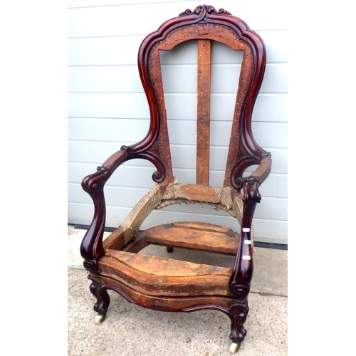 889 - A Victorian easy chair frame with pivot action