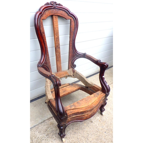 889 - A Victorian easy chair frame with pivot action