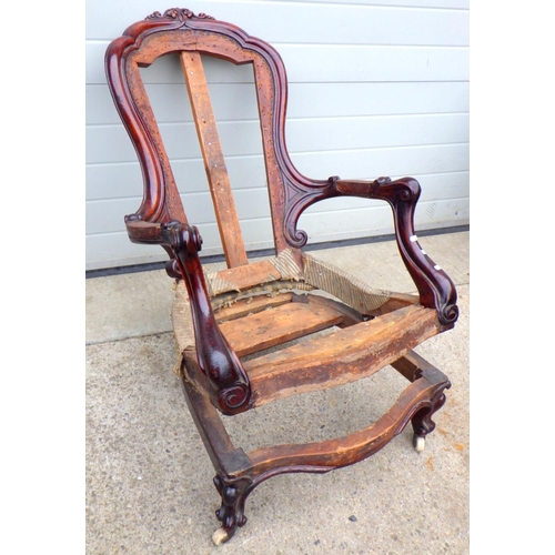 889 - A Victorian easy chair frame with pivot action