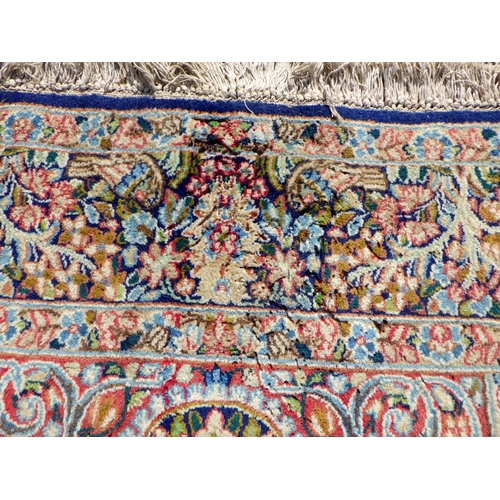 893 - A floral pattern rug, 265cm x 150cm (a/f)
Sold on behalf of the Terry family York (Terry's Chocolate... 