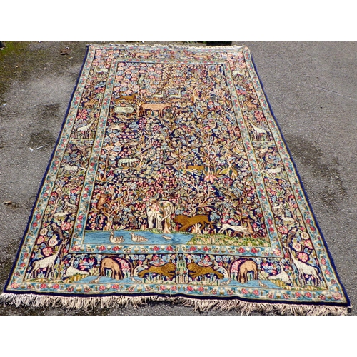 894 - A tree of  life rug, 260cm x 150cm (a/f)
Sold on behalf of the Terry family York (Terry's Chocolates... 