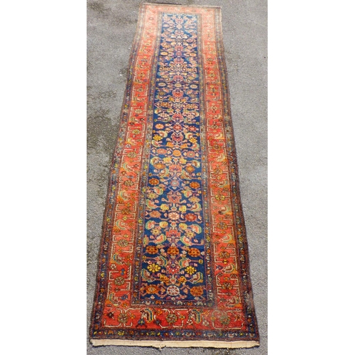 897 - A blue ground runner with red border approx 400cm long x 103cm wide, (a/f)
Sold on behalf of the Ter... 